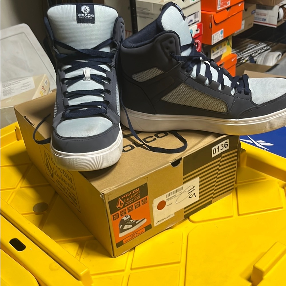 Volcom Black and Grey High-Top Design.  Reduced cost slight defect.  See picture